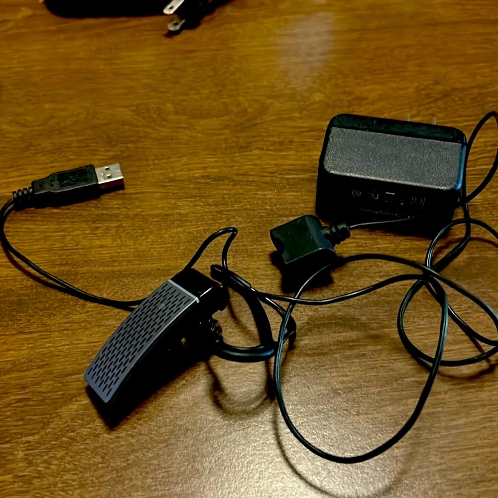 Jawbone Bluetooth earbud and charger